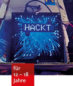 ein tablet auf dem ein blaues Feuerwerk zu sehen ist und der Schriftzug "HACKT"
